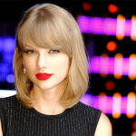 Speculation around 'Is Taylor Swift a Christian?' as she appears thoughtful on the red carpet.